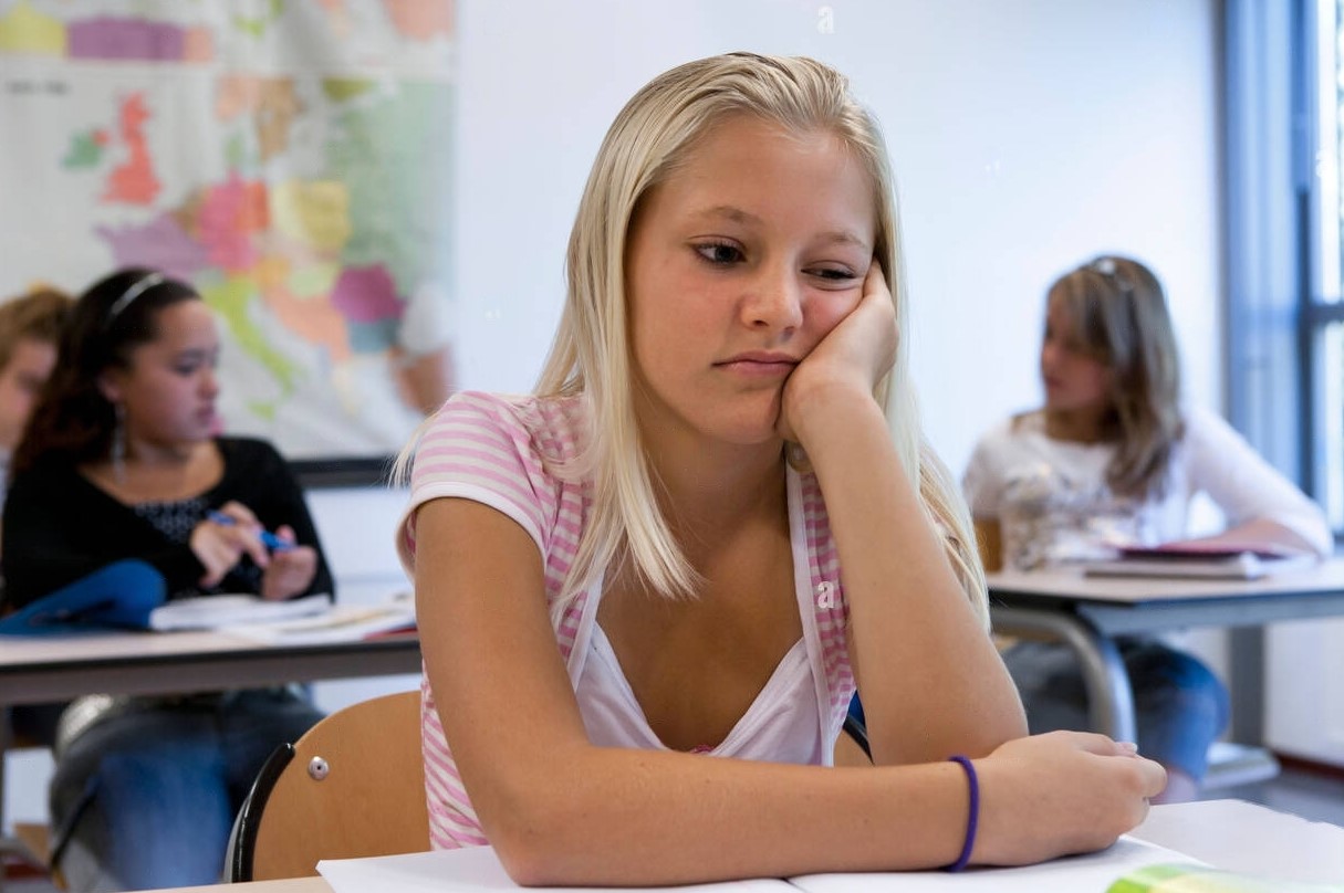 sad-girl-sitting-in-the-classroom-DNC8X7-transformed